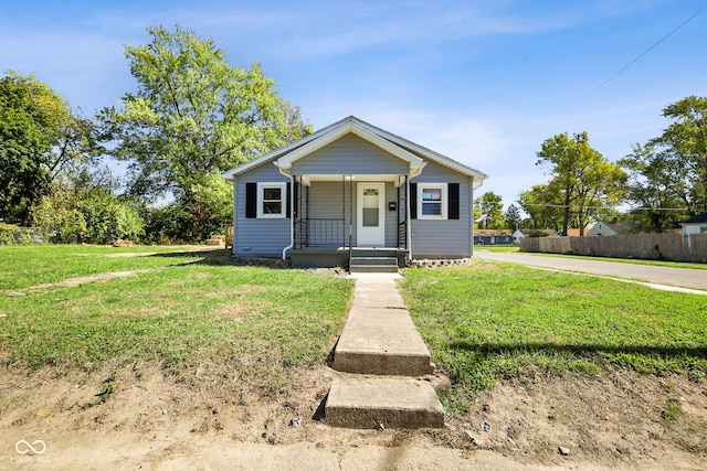 bungalow with a front lawn