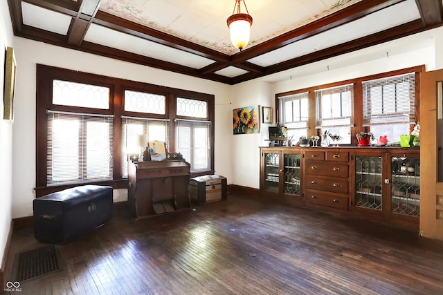 interior space with beamed ceiling, coffered ceiling, and dark hardwood / wood-style floors