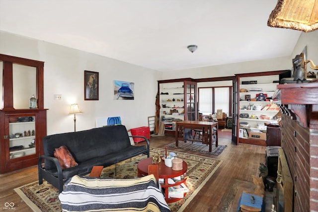 living room featuring dark wood-type flooring