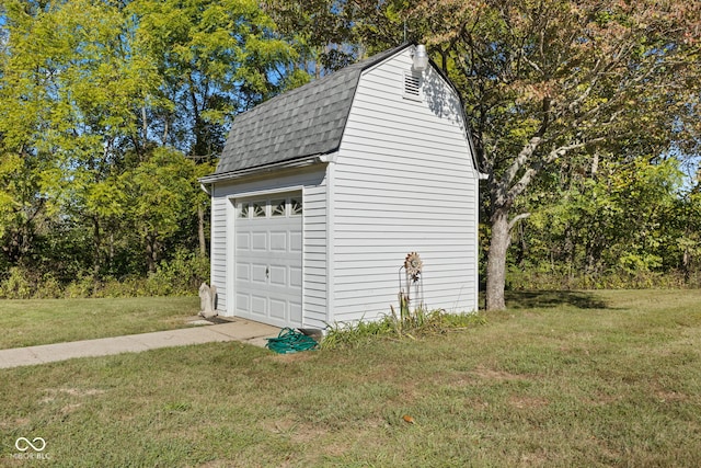 garage with a lawn