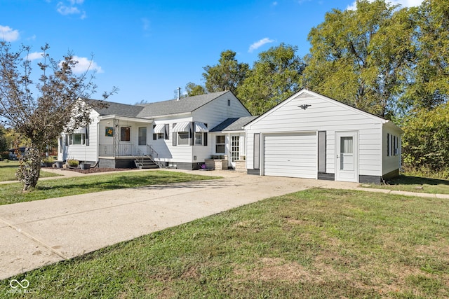 bungalow-style house featuring a garage and a front lawn