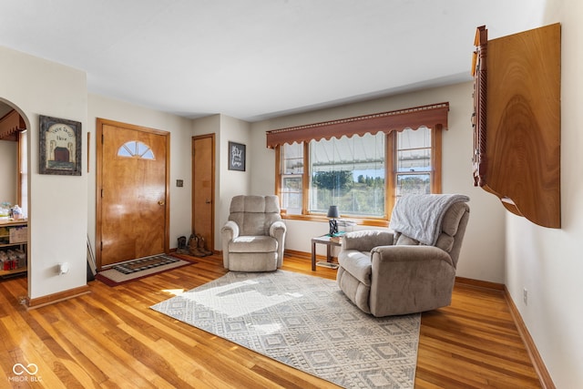 sitting room with hardwood / wood-style floors