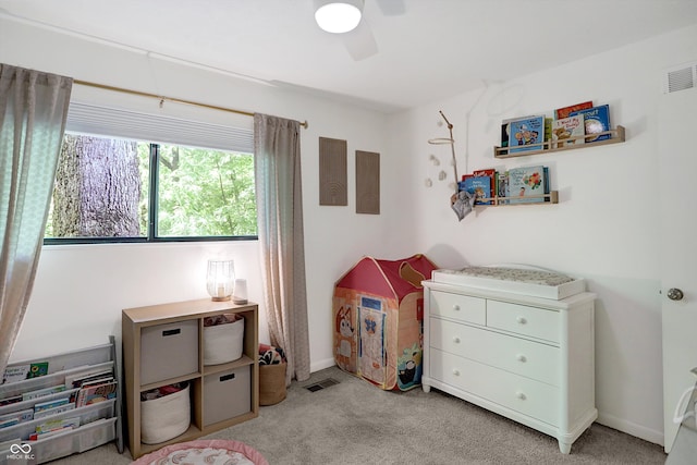 recreation room featuring ceiling fan and light colored carpet