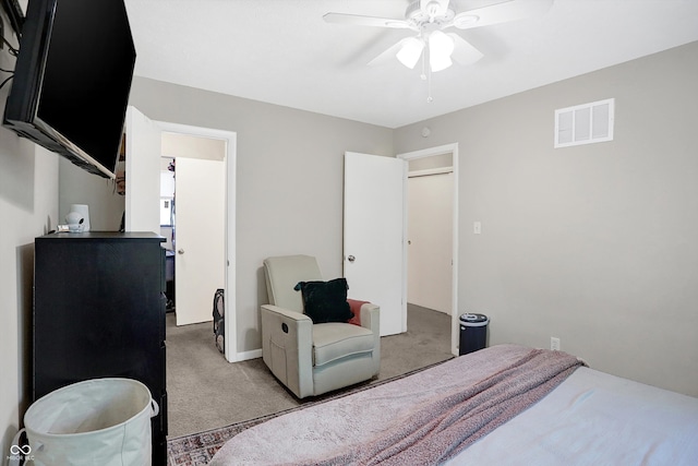 bedroom featuring ceiling fan and light carpet