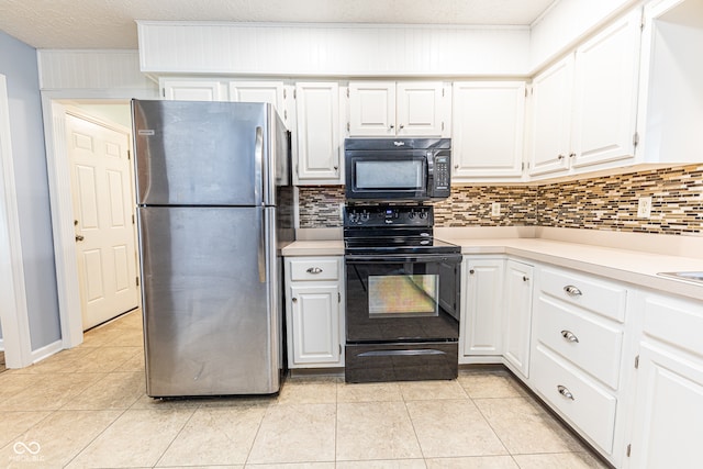 kitchen featuring black appliances, white cabinetry, light tile patterned floors, and backsplash