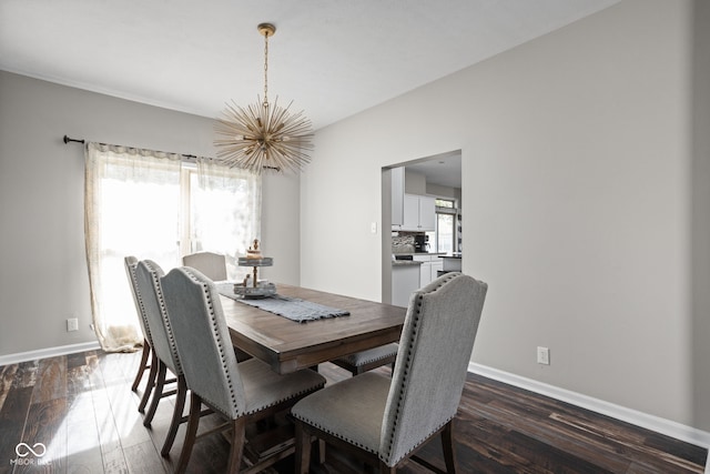 dining area featuring a notable chandelier and dark hardwood / wood-style flooring