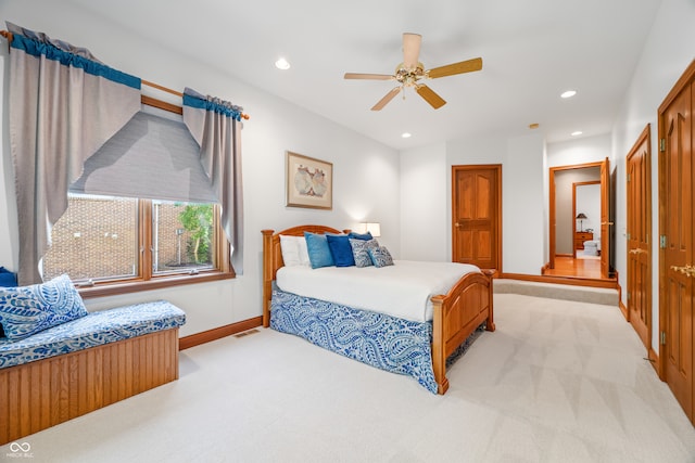 carpeted bedroom featuring ceiling fan