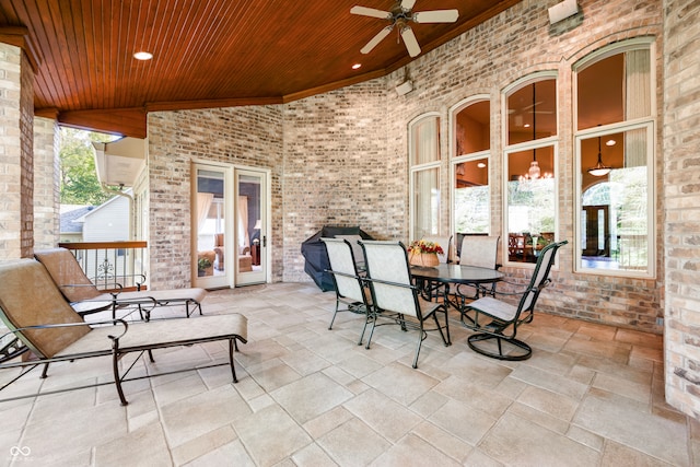 view of patio with french doors and ceiling fan