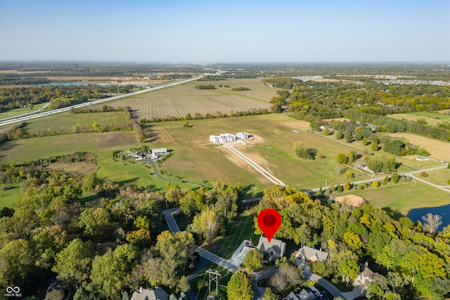 birds eye view of property featuring a rural view