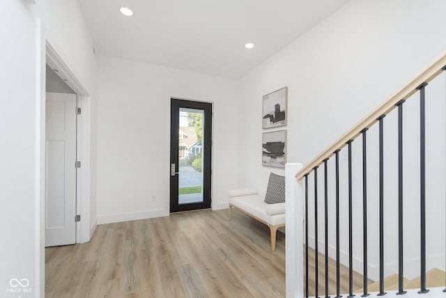 foyer entrance featuring light wood-type flooring