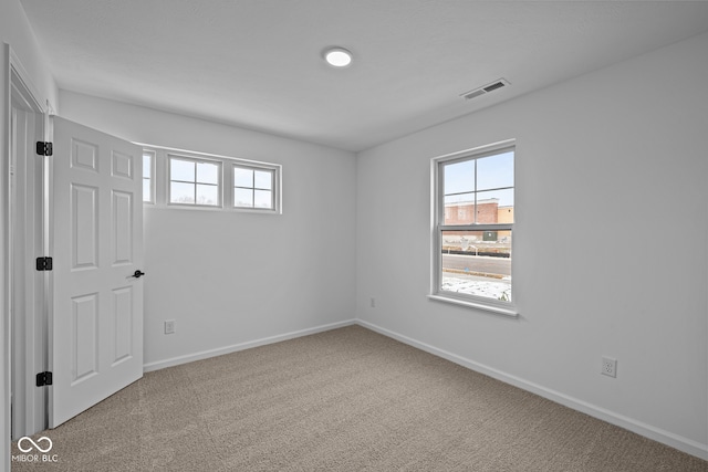 view of carpeted spare room