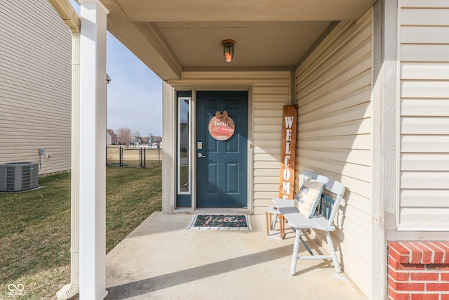 entrance to property with a yard