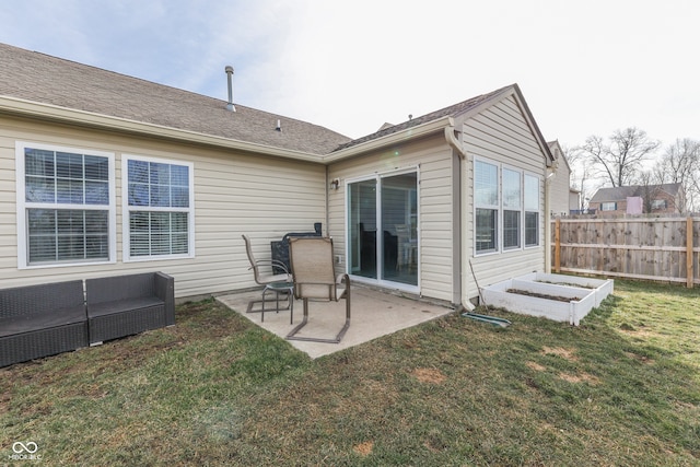 rear view of house with a patio area, a lawn, and an outdoor living space