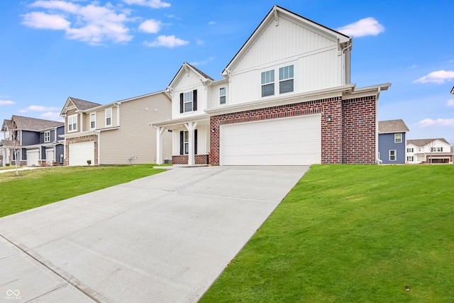 view of front of property with a garage and a front yard