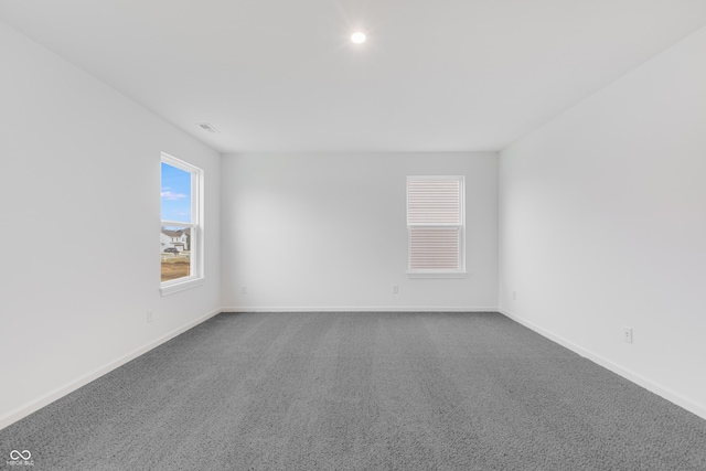 empty room with carpet flooring