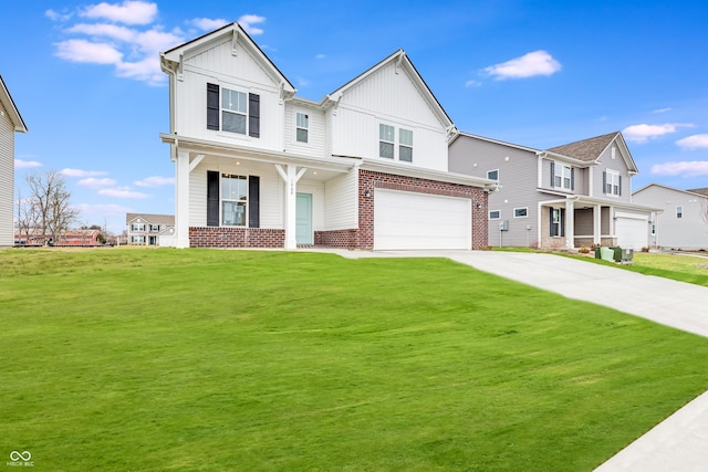 view of front of house with a front yard and a garage