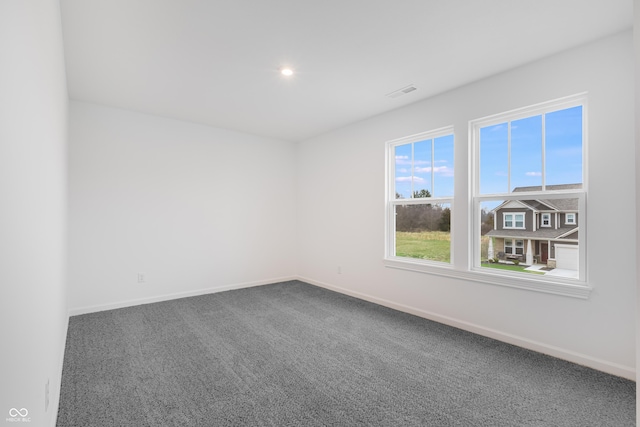 view of carpeted spare room