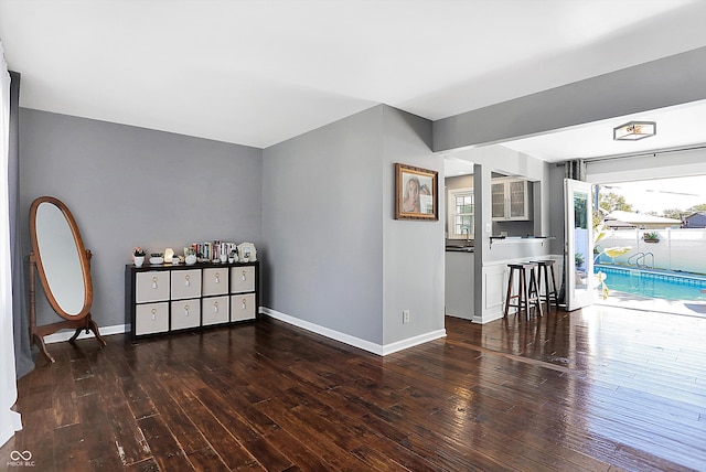 interior space with dark hardwood / wood-style floors