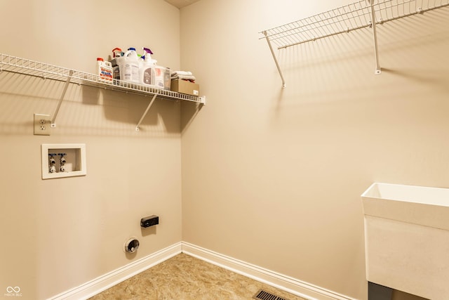 washroom featuring washer hookup, hookup for an electric dryer, and hookup for a gas dryer