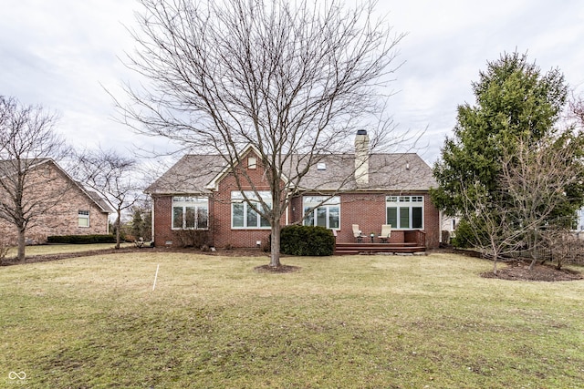 back of house featuring a yard