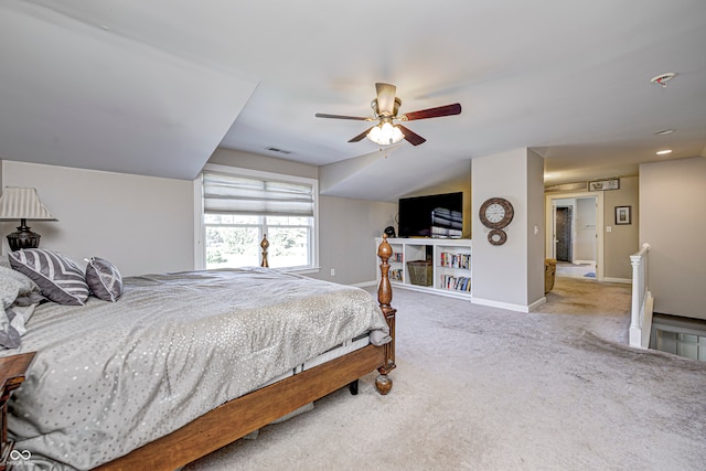 carpeted bedroom featuring ceiling fan, visible vents, and baseboards