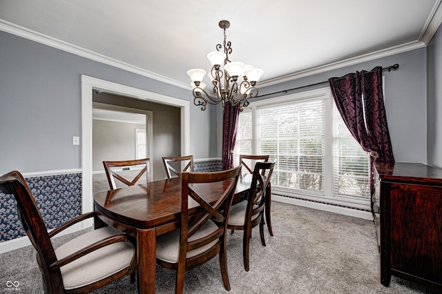 dining area featuring ornamental molding, a notable chandelier, and light colored carpet