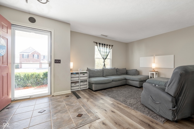 living room with light hardwood / wood-style floors