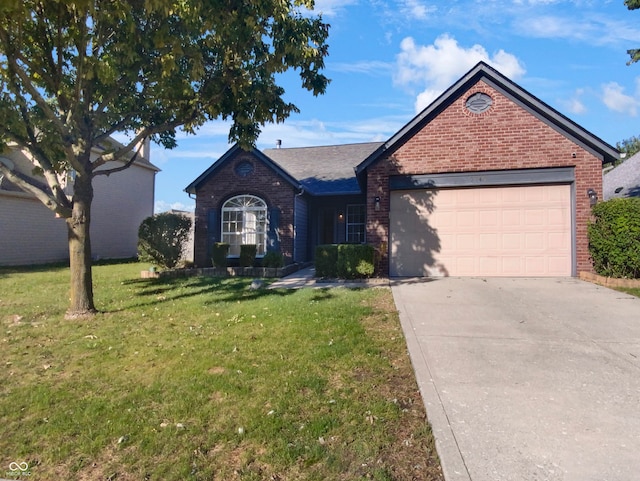 view of front of house with a garage and a front lawn