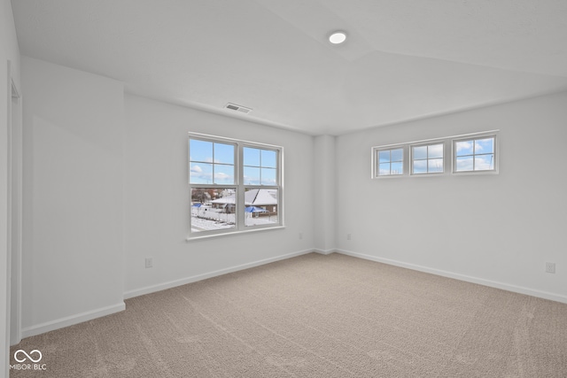 unfurnished room with carpet flooring