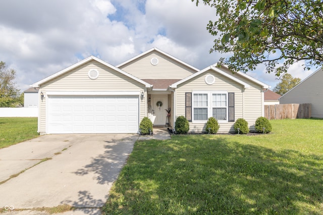 ranch-style house with a garage and a front lawn