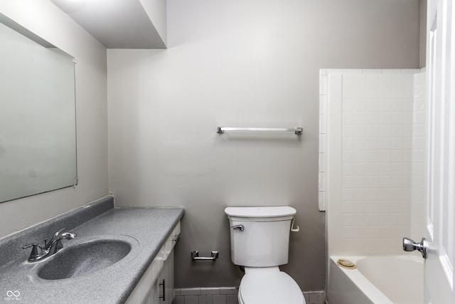 full bathroom with vanity, tile patterned flooring, toilet, and washtub / shower combination