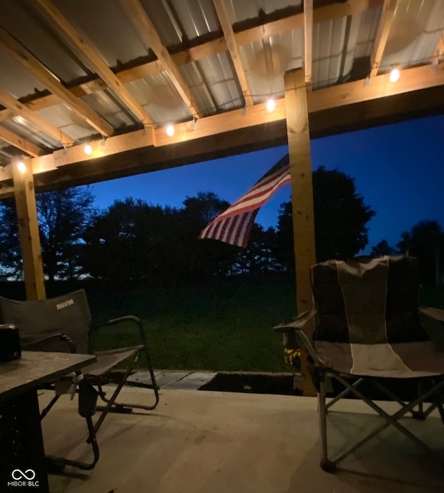 view of patio at twilight