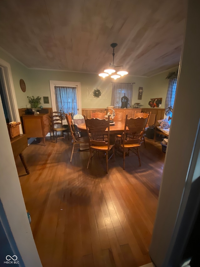 dining room featuring an inviting chandelier and wood-type flooring