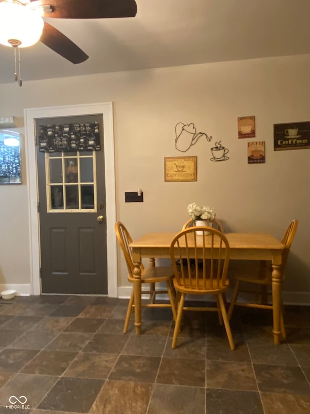 dining room with ceiling fan