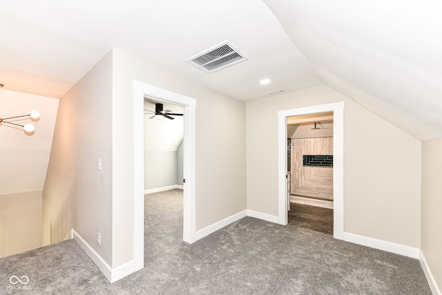 additional living space with lofted ceiling, ceiling fan, and carpet