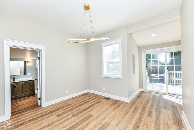 unfurnished dining area with light hardwood / wood-style floors