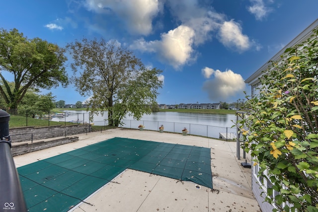 7854 Harbour Isle, Indianapolis, IN 46240 - view of pool with a water view, fence, and a patio area