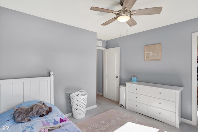 bedroom with light colored carpet and ceiling fan