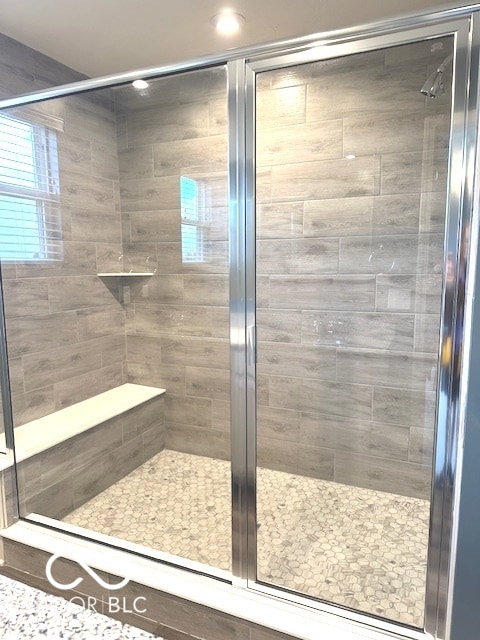 bathroom with an enclosed shower