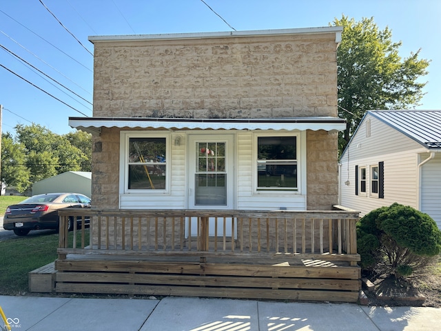 view of front of property featuring a deck