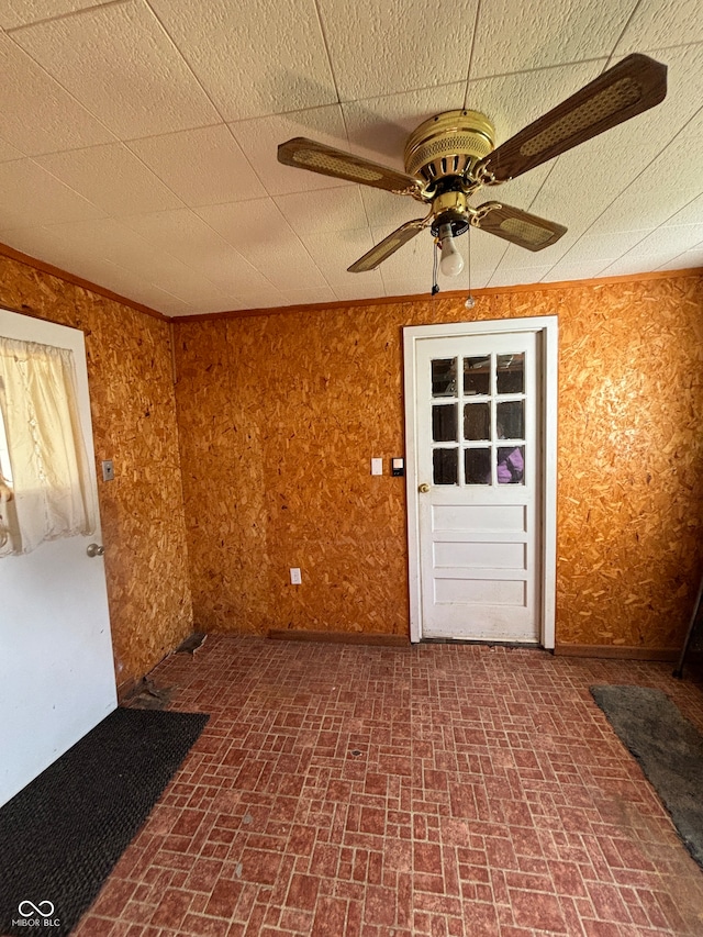 spare room with ceiling fan