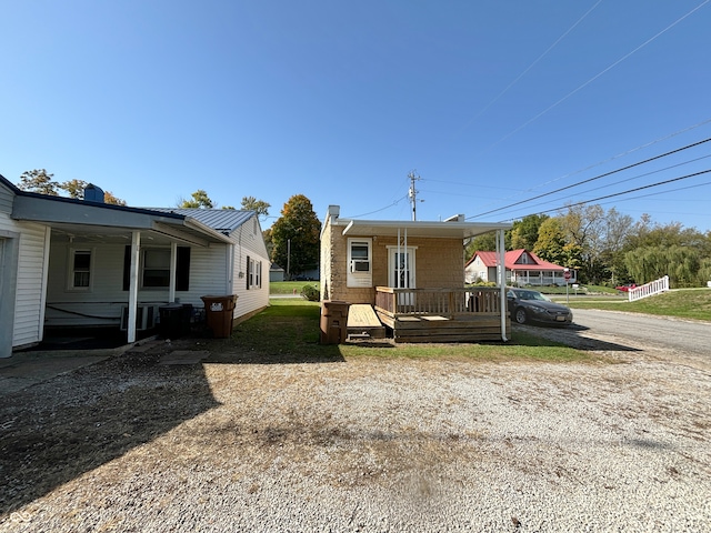 view of front of home with a deck