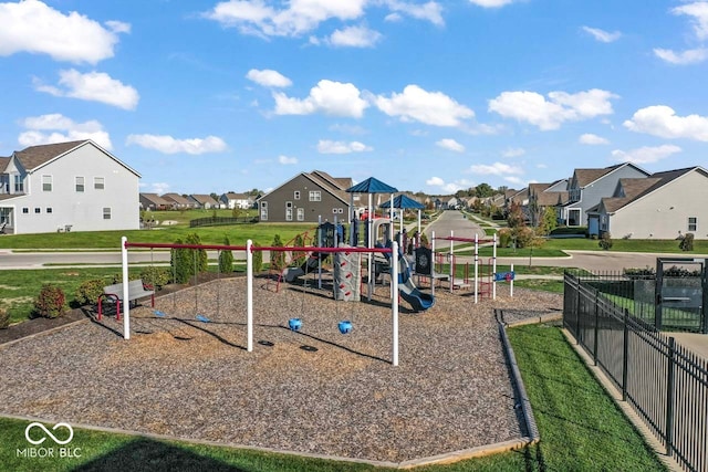 view of jungle gym with a lawn