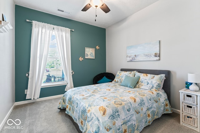 carpeted bedroom with ceiling fan