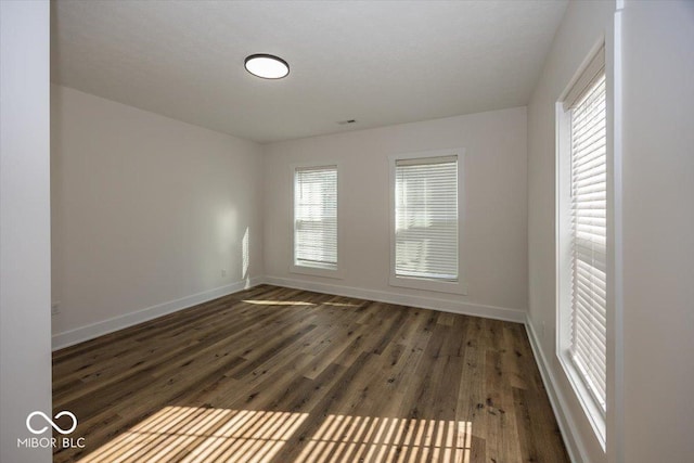 1666 Union St, Indianapolis, IN 46225 - unfurnished room featuring wood finished floors and baseboards