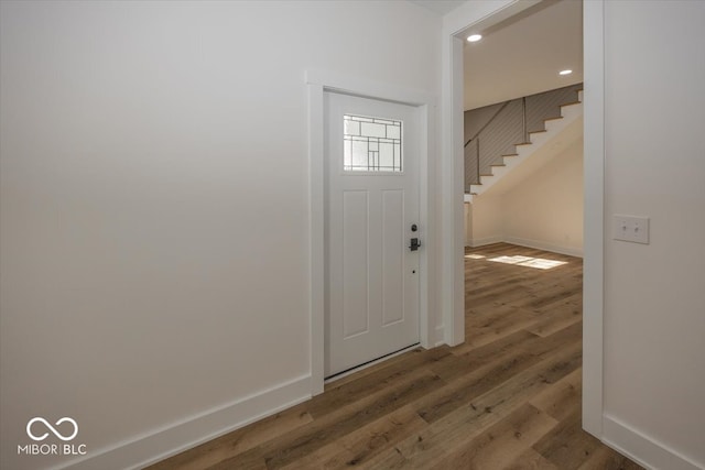 foyer entrance featuring hardwood / wood-style flooring