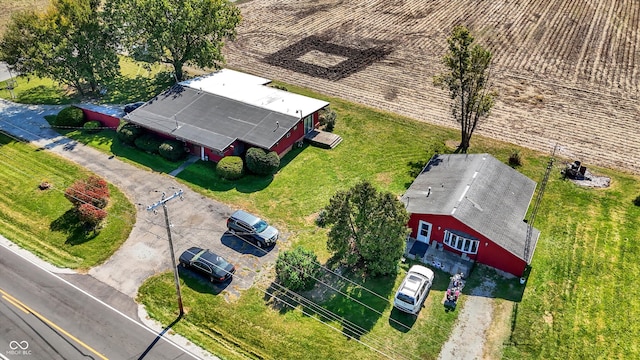 birds eye view of property featuring a rural view