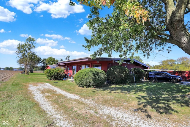 view of front of home with a front lawn