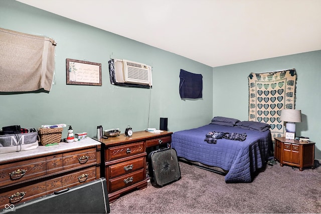 carpeted bedroom with an AC wall unit