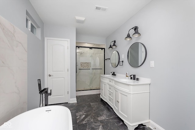 bathroom with vanity and independent shower and bath